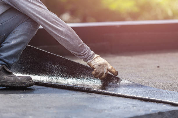 Professional Waterproofing technician working in Huntington, NY